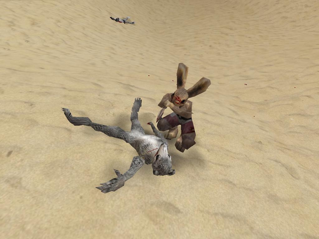 Lugaru: a crouching bloodied rabbit holding a knife stands over a defeated gray wolf on rippled desert sand.